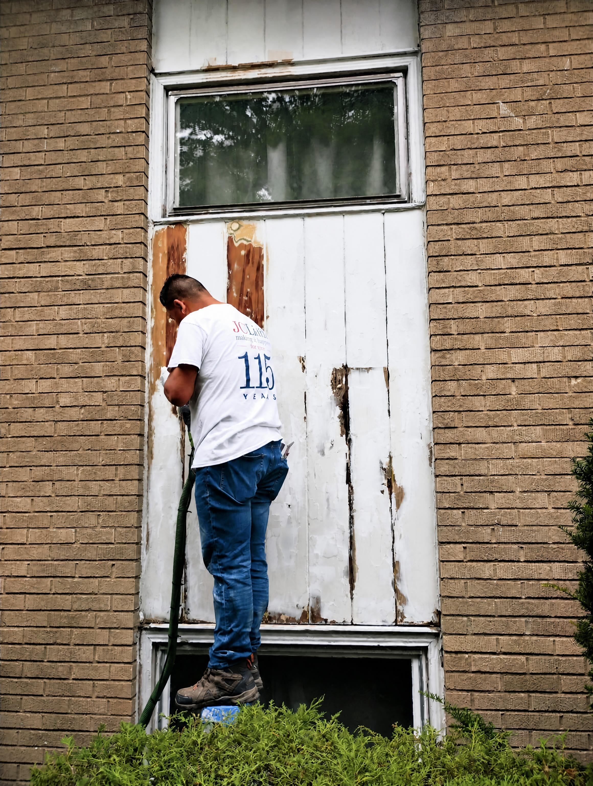 Brick and siding suburban house exterior